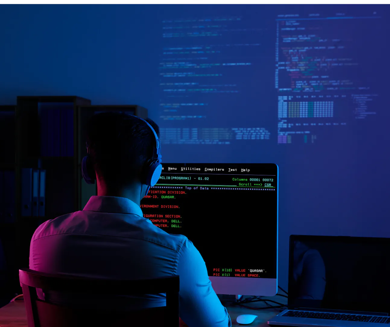 A COBOL program open on a mainframe terminal screen